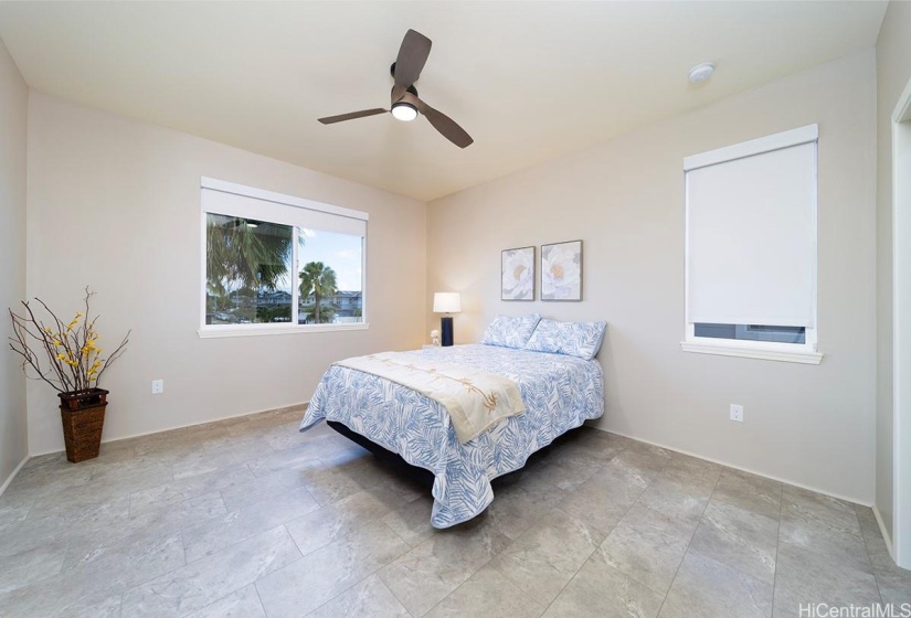 Primary Bedroom with connected bathroom suite.