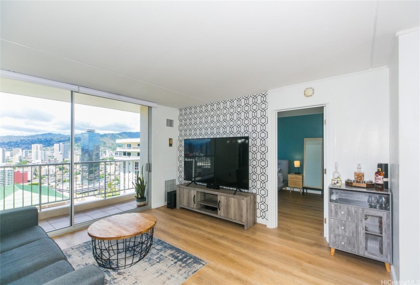 Living room overlooking lanai and city/canal view