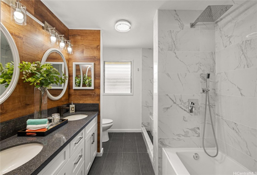 Front home bathroom with tub and shower