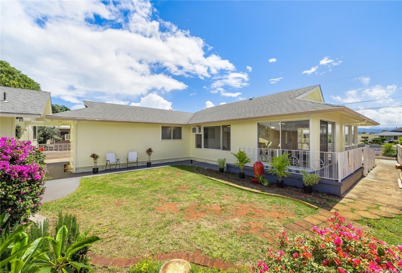 Courtyard between front home and main home offers privacy