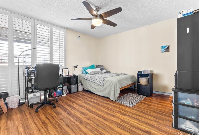 Plantation shutters add a nice touch to primary bedroom