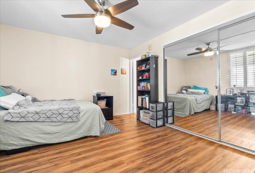 Primary Bedroom next to lanai has good space and sliding bedroom door