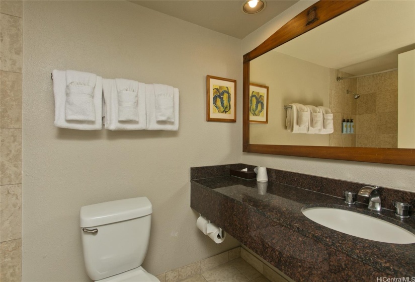 Spacious bathroom with a tub.