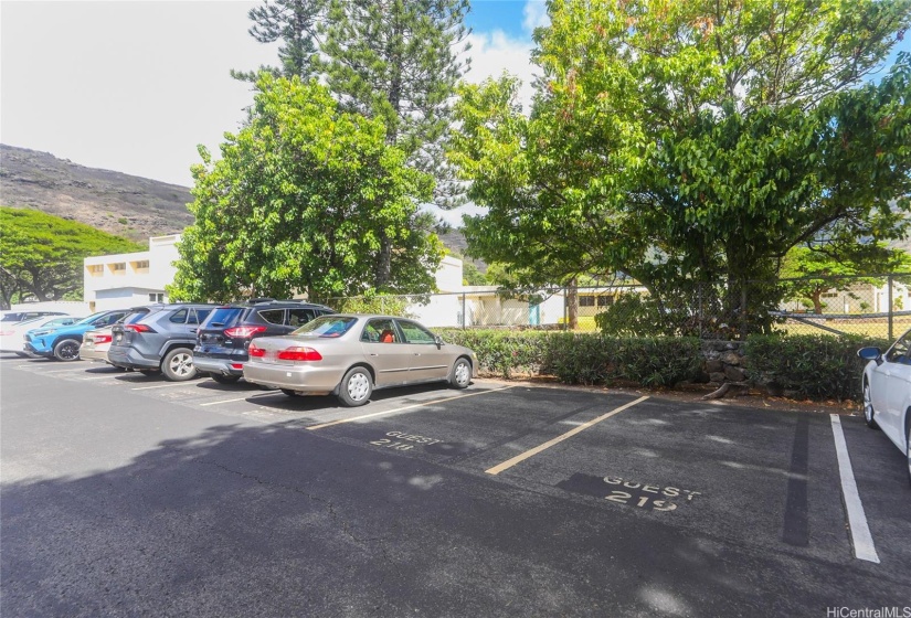 2nd parking stall across the driveway is just to the right of the 5 Guest stalls serving   homes at this location