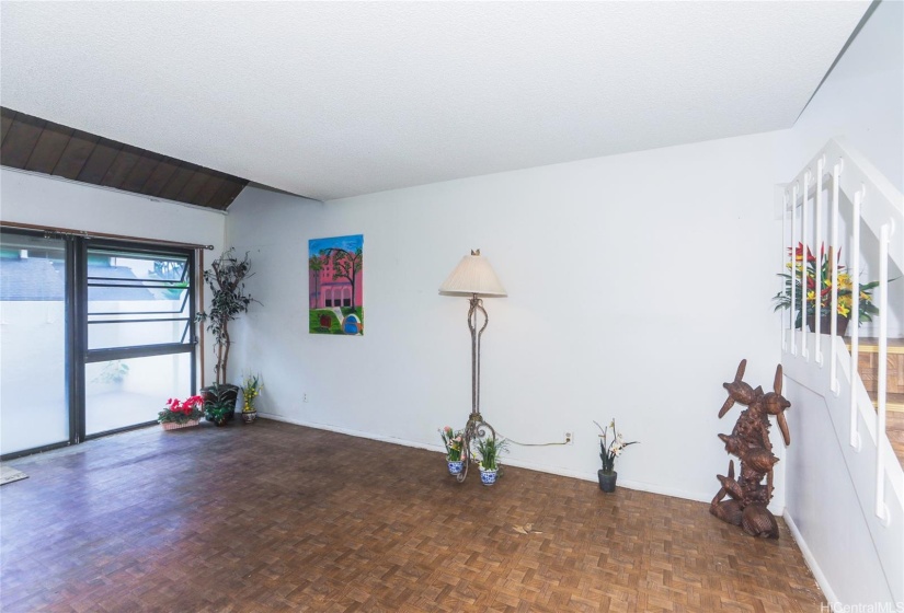 Living room flows out to the private lanai/patio