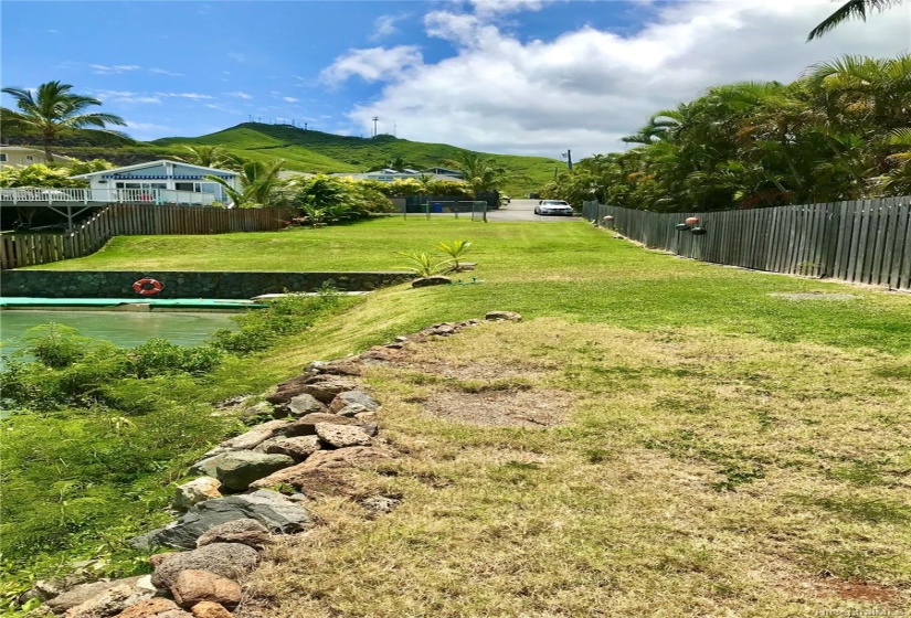 Narrower view looking from the ocean end of the property back to the building area of the subject property.