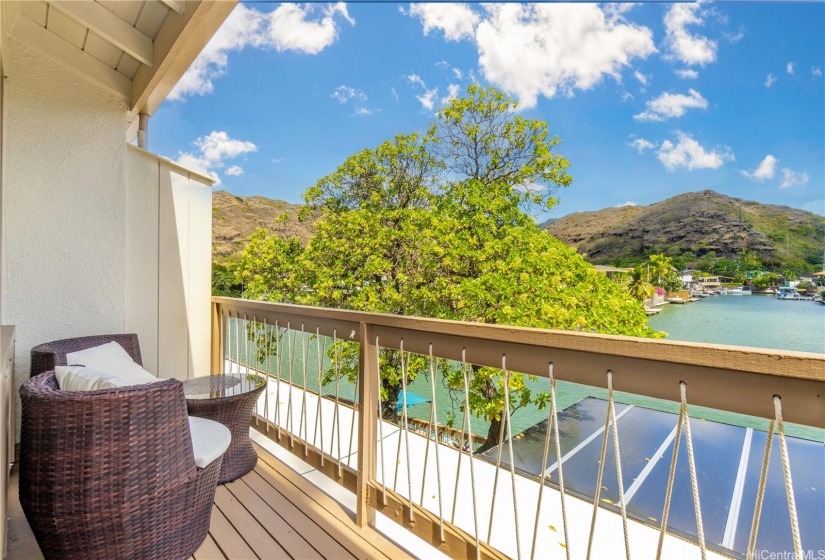 Upstairs primary bedroom patio overlooking the marina view.