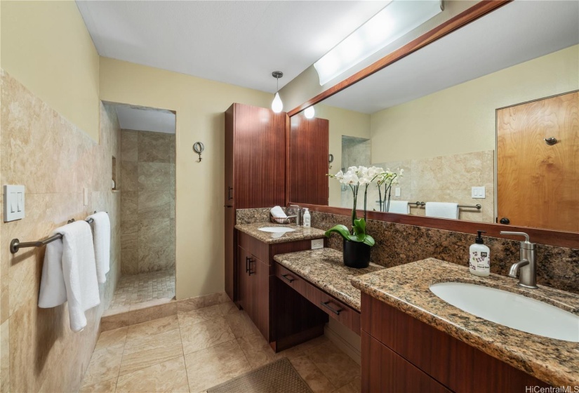 Primary bathroom. Shower on the left and WC on the right of double vanity