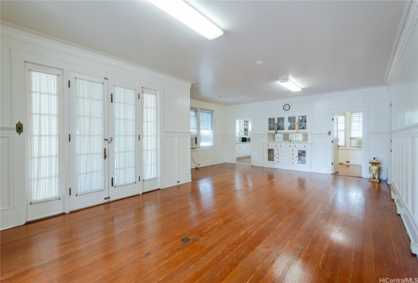 Double side doors open to patio and built-in cabinet