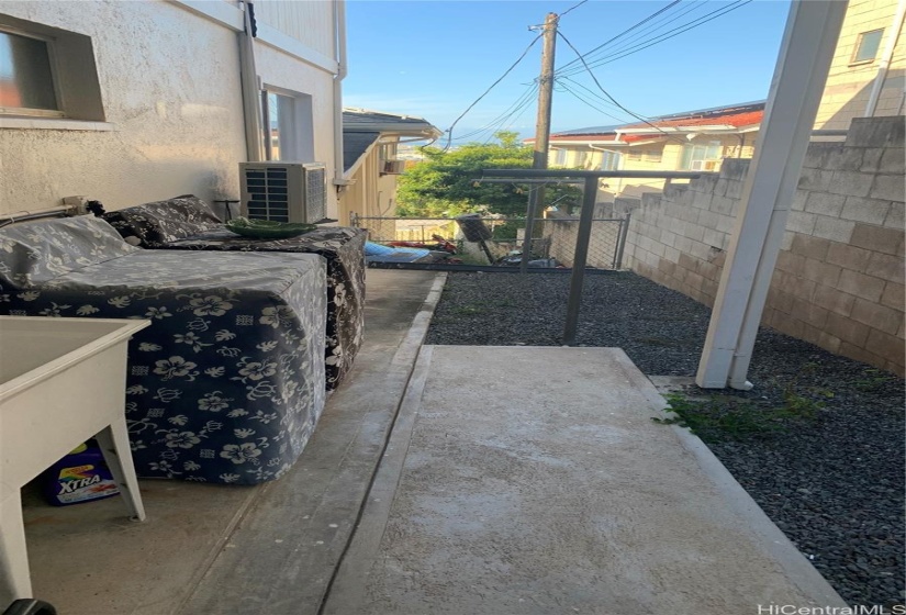 Laundry machine at back yard