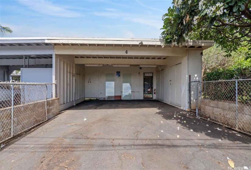 Two car garage with storage and small gate