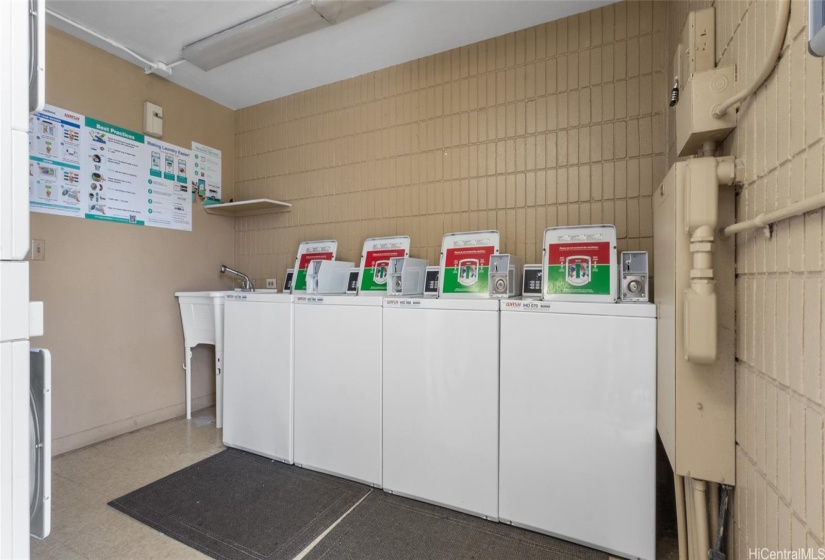 Coin operated laundry room is adjacent to the pool, around the corner from your unit.