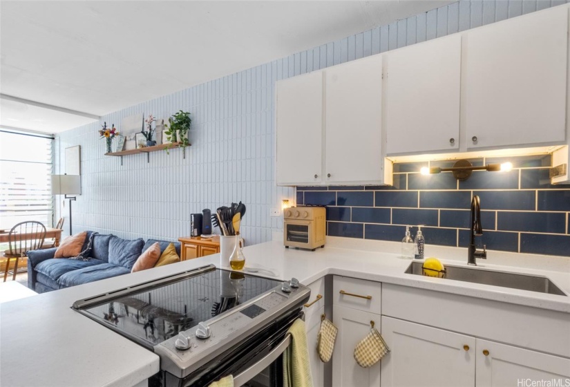 The kitchen has great counter space and is comfortable enough for several people to move around in.