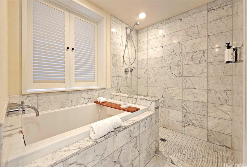 Another view of the main bathroom. Deep soaking tub after a fun filled day under the sun and water!