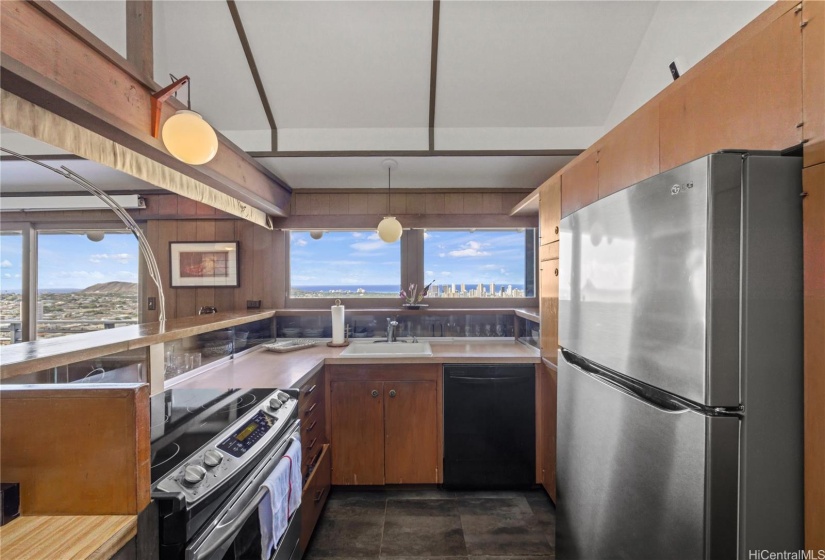 Kitchen with views of the living and dining rooms.