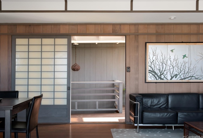 Sliding door to the entry way from the living room.