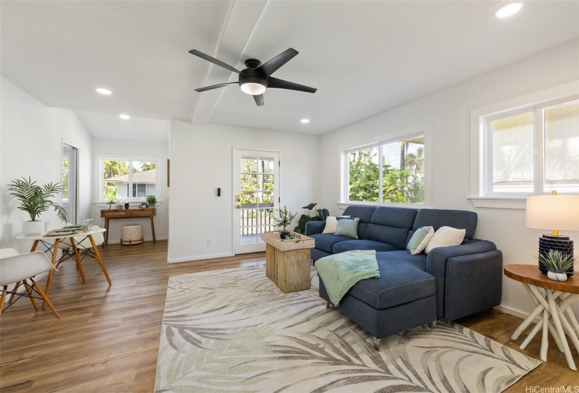 Living space the 2/1ba large covered lanai leading out front door.