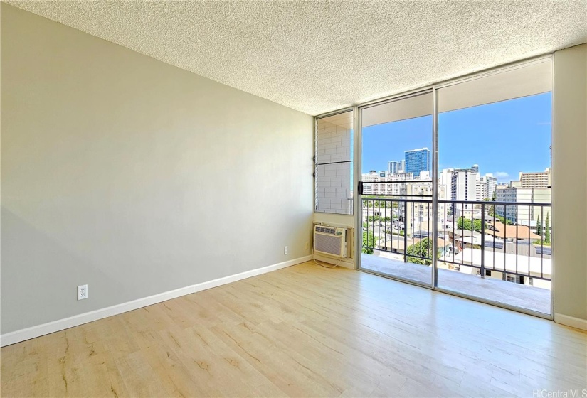 Living room with city and mountain views