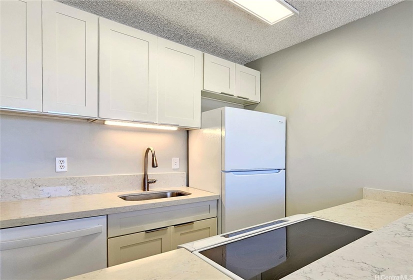 Kitchen with new appliances, countertops and cabinets