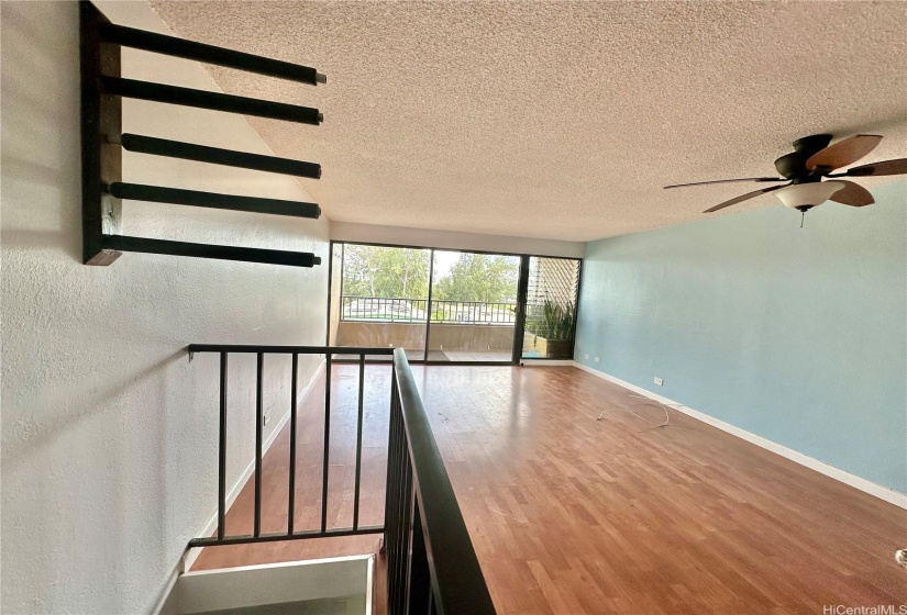 Stairway, living room, built in surf board storage