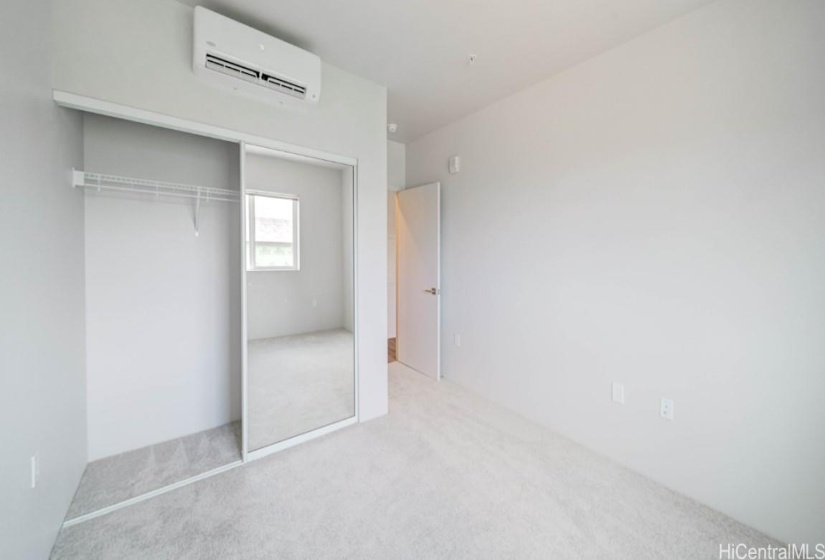 Mirrored wardrobe doors in bedroom 2