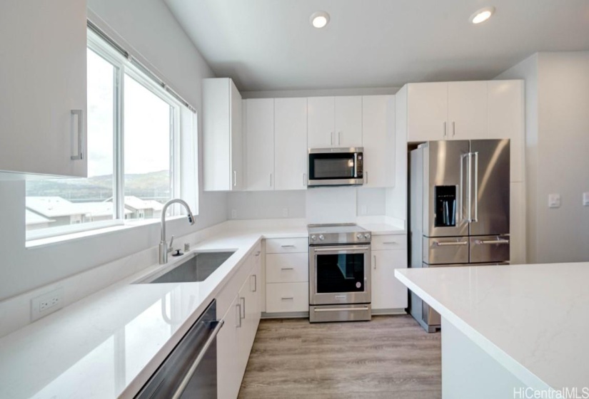 KitchenAid Appliances in Kitchten with undermount sink.