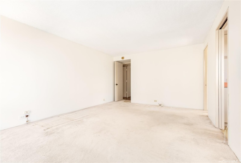 Looking to the foyer with the separate bedroom to the left