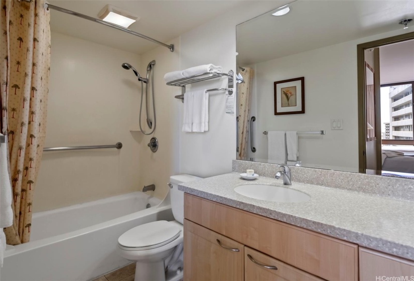 Spacious and renovated full bathroom with extra closet.