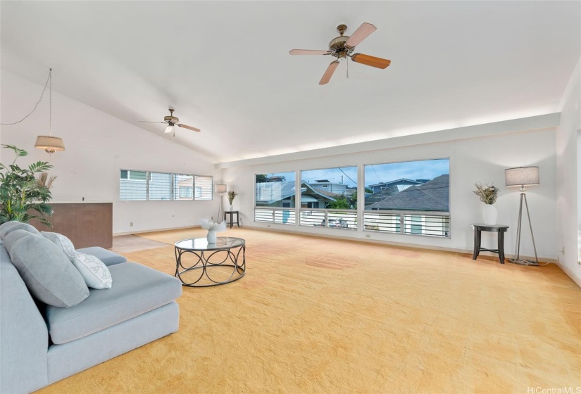 Expansive living area on it's own floor of this multi-level single family home.