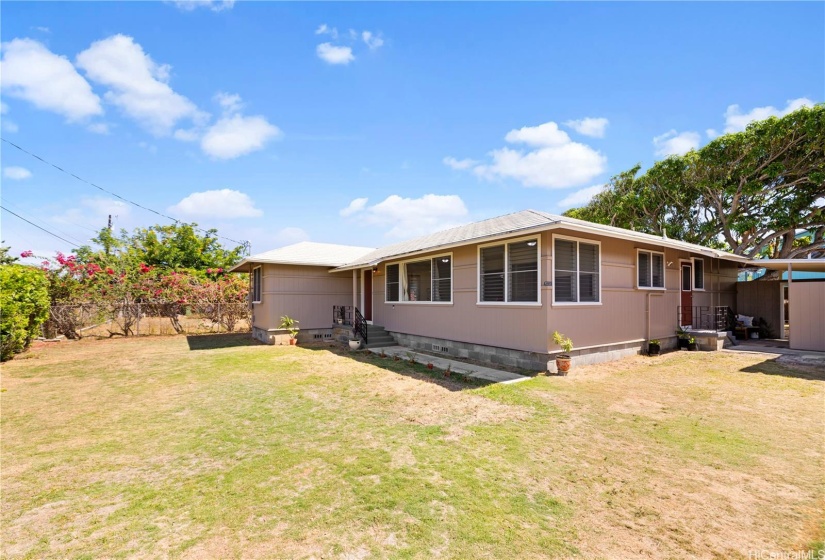 Front of home with large front yard