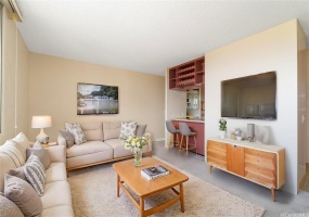 Virtually Staged. Spacious and bright living room connecting to the kitchen with the dining counter.