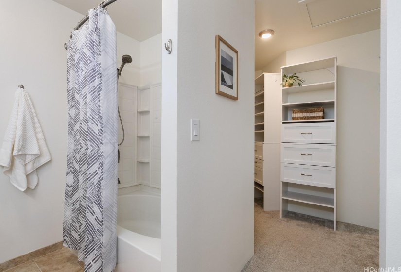 Primary shower and walk in closet.