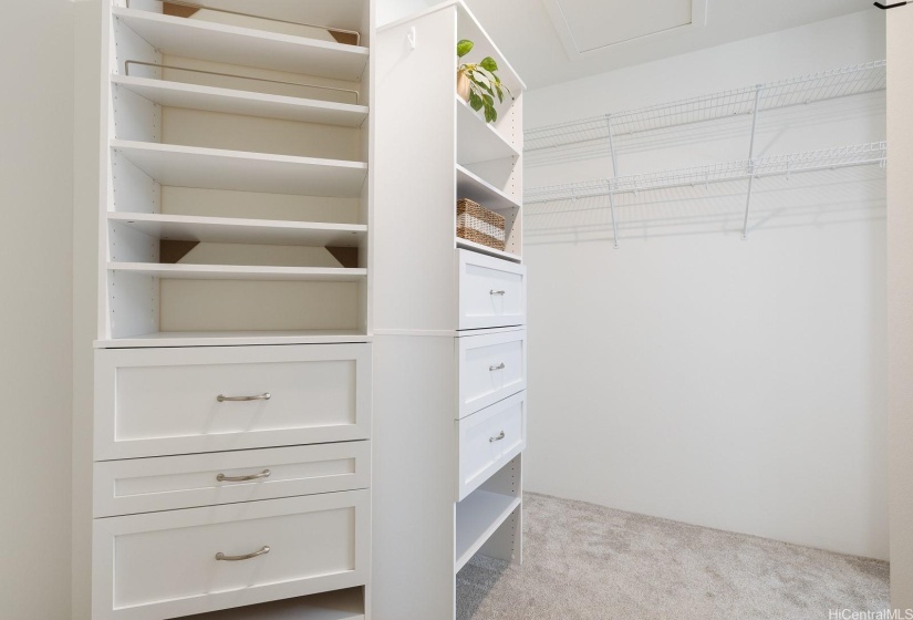 Walk in closet in Primary bedroom has a closet system.