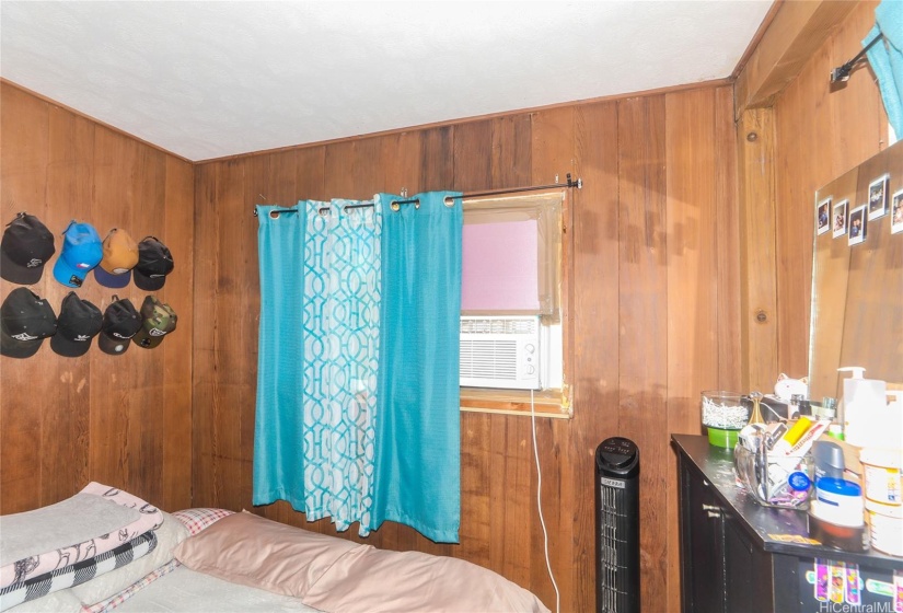 Another Bedroom all with wood paneling