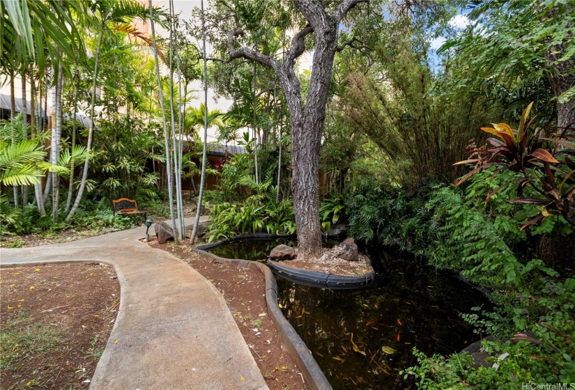 A serene koi pond that enhances the tranquil atmosphere of Plaza Landmark.