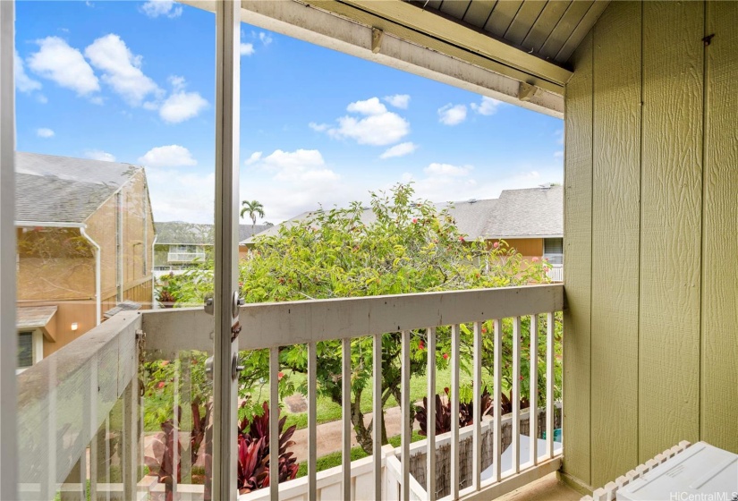 Primary bedroom has a private lanai. Enjoy your own outdoor escape in this comfortable living space!