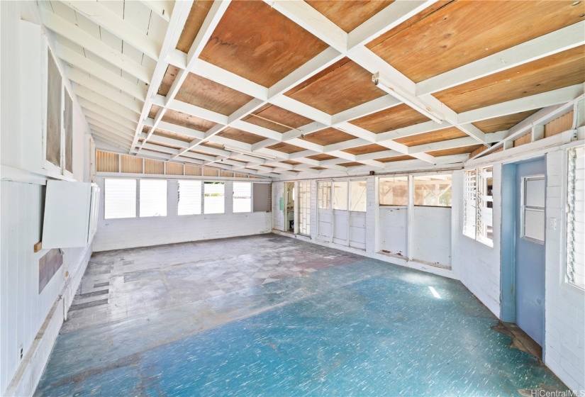 An extended partly enclosed ceiling porch that adds a unique touch to your living space!