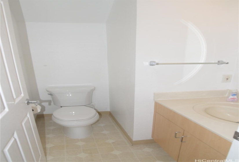 Half bath with lavatory cabinet upgrade