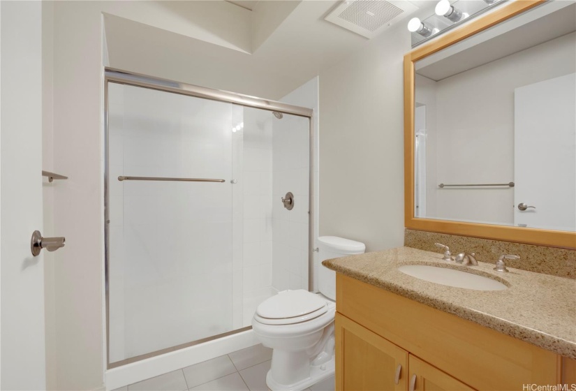 Primary Bedroom In Suite Bathroom