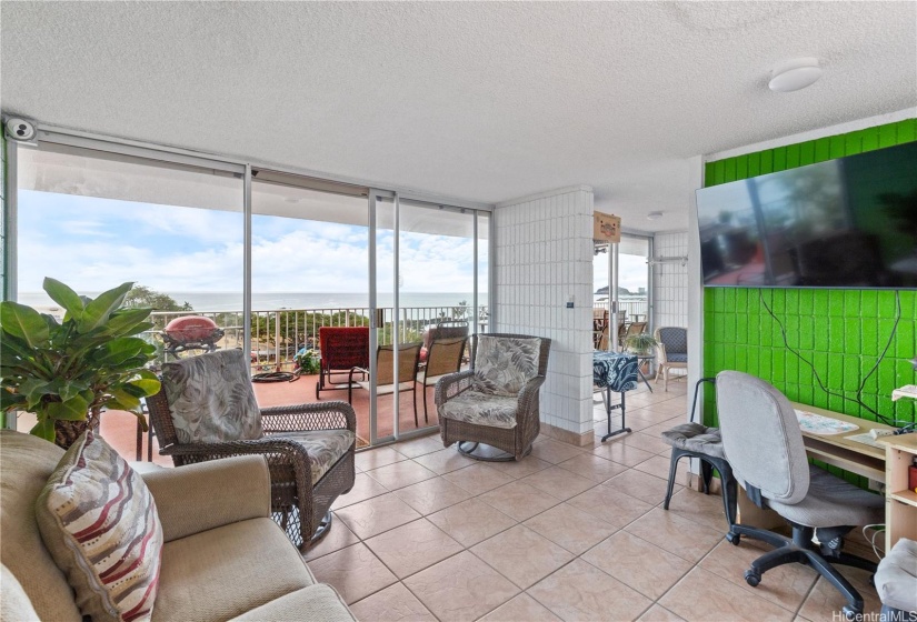 Rooftop clubhouse media room, good area for remote work.