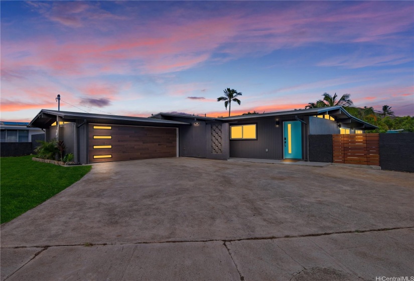 Front Yard is Generous and Shows off this Corner Lot Kailua Stunner... EnclosedGarage gives you even more storage space or additional parking on top of the largedriveway that can fit multiple vehicles.