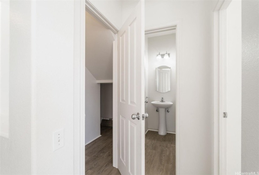 Just a peek into the half bath and under stair storage downstairs.