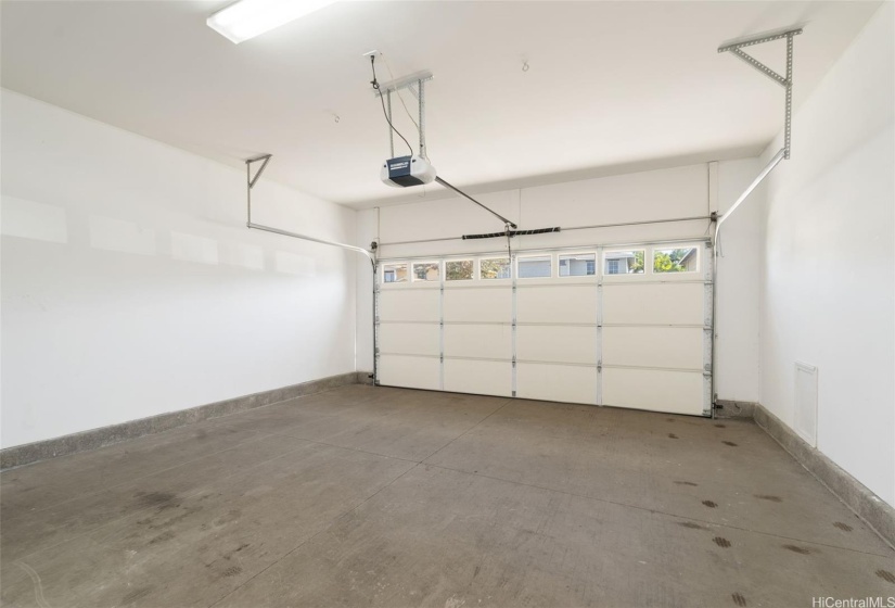 Having the laundry room inside means your two car garage can really hold two cars!!