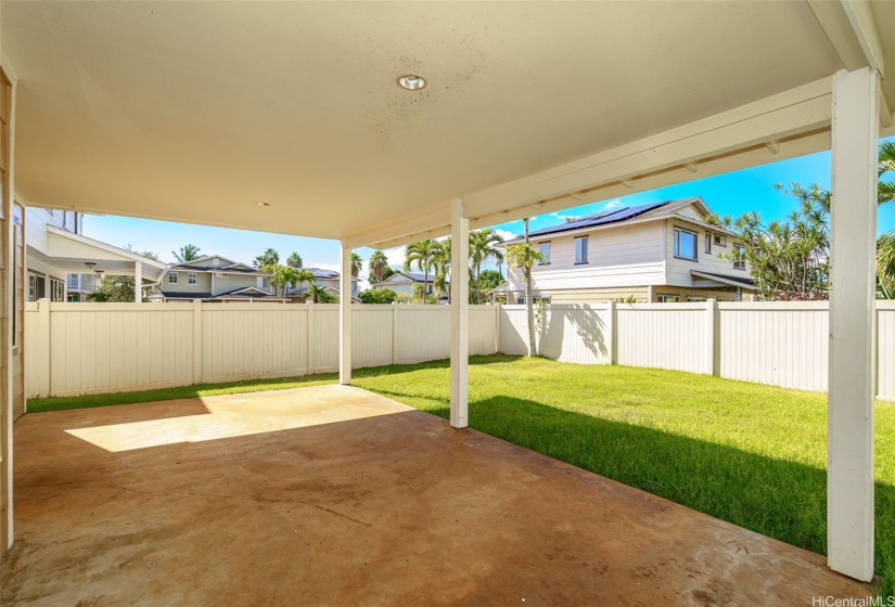 Another view of the huge covered lanai and out to the great back yard.