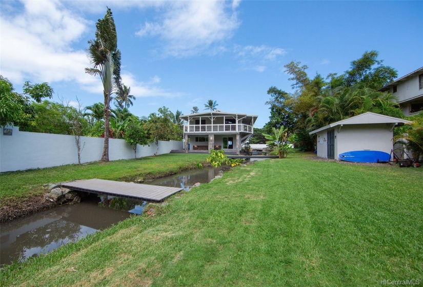 Adjoining beach lot for sale with stunning newly renovated ocean view residence.