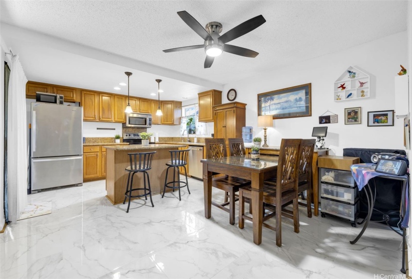 Open Concept Design That Invites a Warm Flow Between the Kitchen & Dining Area.