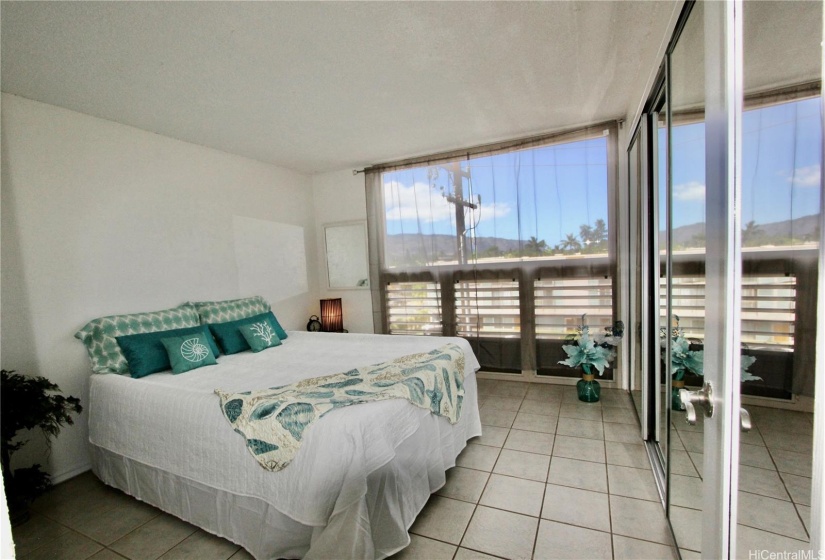 Bedroom No. 1 with mirrored closet doors