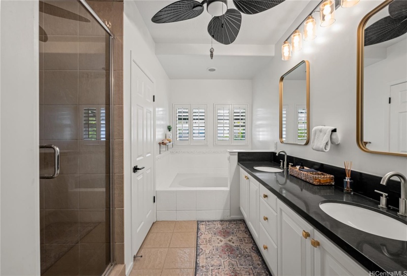 Primary bath has a dual sinks, soaking tub, large walk-in shower and separate toilet area