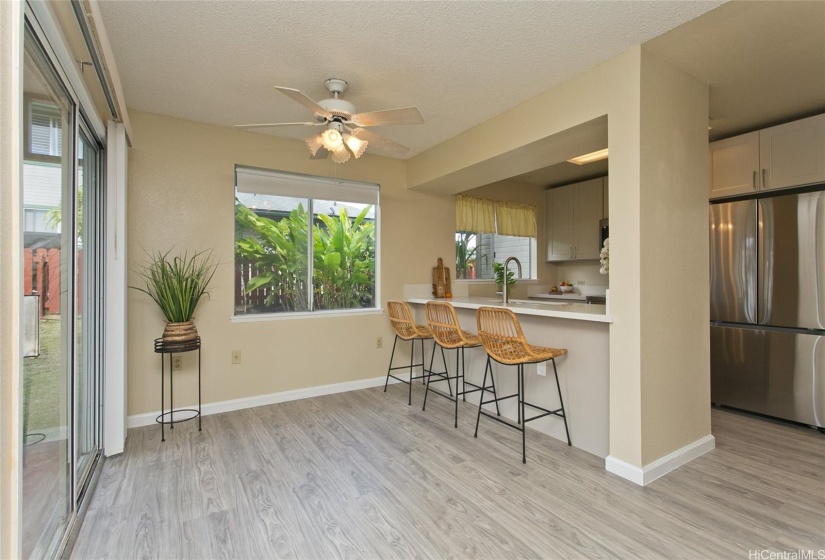 INDOOR-OUTDOOR LIVING with brand new kitchen.