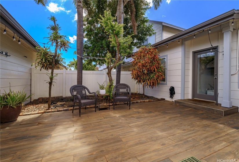Private, spacious custom-tiled yard